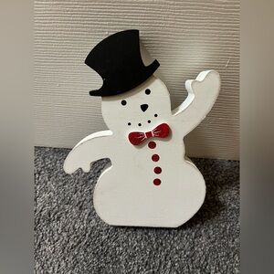 Charming Snowman Holiday Decor with Black Hat and Red Accents
